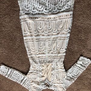 White lace dress. A Line up the knee key hole back